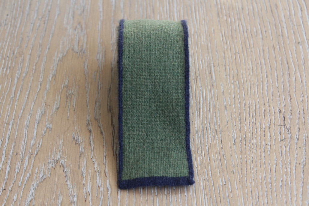 Tie wool green with blue cord.
